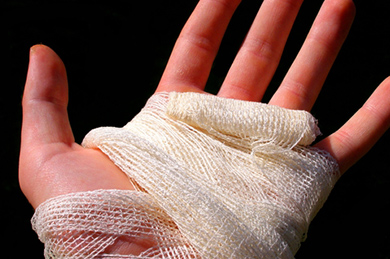 burn injury bandaged hand